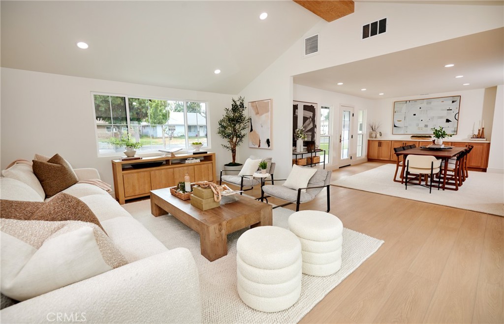 Beautifully remodeled Anaheim home offering brand new systems, luxury finishes, and modern functionality. Wide-plank light wood floors, quartz countertops, custom cabinetry, and stainless steel appliances anchor a bright open layout that flows seamlessly to a private yard. Upgrades include new plumbing, electrical, dual-pane windows, and a new roof. Finished garage with epoxy flooring adds flex space. Located minutes from Disneyland, The Packing House, and major freeways. Turnkey, stylish, and ideal for entertaining or family living.