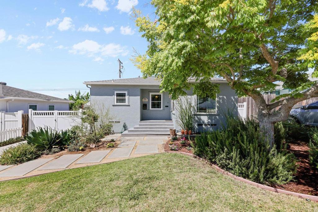 Live in La mesa! This 2 bedroom, 1 bathroom DETACHED home is ready for its new owner. This property has a great mix of original charm and modern updates. The original hardwood floors and built-in cabinets pair well with the modern convenience of the updated Kitchen and bathroom. Additional value adds include dual pane windows, updated HVAC, a tankless water heater, and a newer roof. The front yard is beautifully landscaped with modern hardscape to compliment the curb appeal. The backyard is a good size with additional space behind the garage that would be perfect for a garden. The detached single car garage has an additional room on the side that houses the washer/dryer. The long driveway allows for multiple vehicles to enjoy off street parking. Just 2 miles from downtown La Mesa, close to the Kroc Center and centrally located, this is the house you have been waiting for!