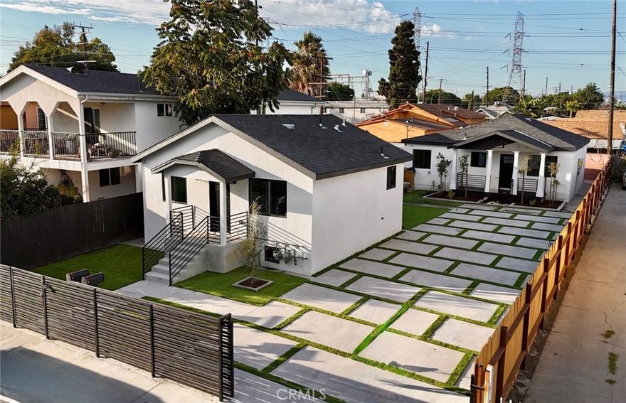 Welcome to a rare turn-key duplex opportunity in the heart of South Los Angeles. This beautifully remodeled property features two fully upgraded units, each with premium finishes and strong appeal for both owner-occupants and investors alike:

Front Unit: 2 bedrooms, 1 bath

Rear Unit: 3 bedrooms, 2 bath

Every inch has been thoughtfully transformed with new plumbing, new electrical, full HVAC systems, a brand-new roof, modern kitchens with contemporary countertops, and tastefully remodeled bathrooms. Both units deliver modern comfort and aesthetic appeal, ready for immediate move-in or rental.

Outside, the property impresses with its generous amenities. The lot accommodates parking for 8–10 vehicles, ideal for tenants or multi-family use. A stylish driveway of square pavers leads to the entry, flanked by low-maintenance artificial turf for a clean, green curb appeal. The entire property is securely fenced, ensuring privacy and ease of maintenance. A large, inviting yard provides a perfect setting for BBQs, outdoor gatherings, or relaxing evenings with family and friends.

Neighborhood & Location Highlights

Just minutes to Green Meadows Recreation Center (431 E. 89th St.), offering community programs and park space.

Close to Augustus F. Hawkins Nature Park, a local nature preserve with walking trails and native landscaping.

Also nearby: Franklin D. Roosevelt Park, a well-loved community green space with recreational amenities.

Walkable to several shopping centers: according to listings in the area, 1414 E 100th St (very close by) has three shopping centers within ~1.4 miles, including Martin Luther King Jr. Shopping Center and Imperial Park Plaza, giving you convenient retail, dining, and service access. Easy access to major thoroughfares and freeways (via the nearby commercial corridors), enhancing connectivity across Los Angeles. (Many listings in the area note proximity to major freeways). 

Why This Property Stands Out:

Fully remodeled from top to bottom

Dual units (2 + 3 beds) offering flexibility

High parking capacity — a major asset

Secure, fenced, low-maintenance landscaping

Excellent yard for community or family use

Strong location with parks, shopping, and freeway access nearby