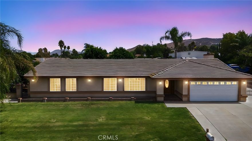 Charming single-story 4-bedroom, 2-bath home located near Jurupa Valley, offering spacious living in a peaceful, equestrian-friendly neighborhood. This well-cared-for property features an open floor plan with a bright living area, a cozy fireplace, and a functional kitchen with plenty of cabinet space—ideal for everyday living and entertaining. Sitting on a generous lot, there's ample outdoor space for customization, with room for RV or trailer parking and potential for horse accommodations if desired. Enjoy the quiet, rural atmosphere with convenient access to riding trails, shopping, and major freeways.