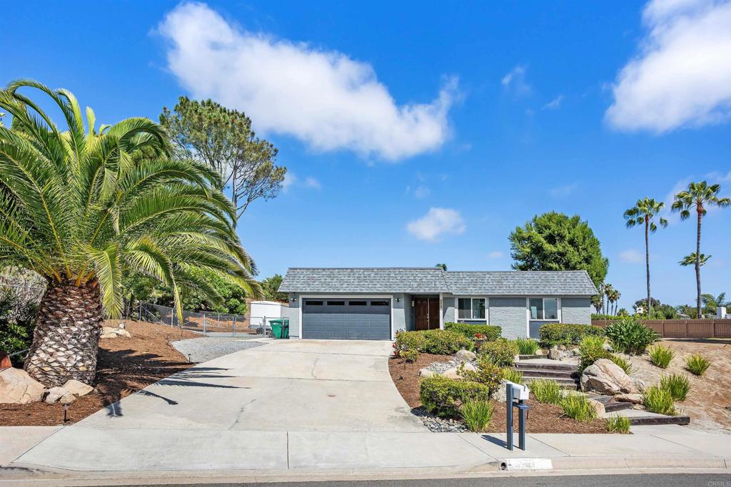 Hurry, schedule a showing!! Remarkable 4 bed 2 bath single story home in Oceanside's premier neighborhood, Henie Hills. This home has been tastefully updated including roof, windows, doors, kitchen and bathroom remodels, flooring, paint and much more! You'll love this huge kitchen with commercial stove. Spacious open floorplan is perfect for entertaining. Huge, level yard has garden and fruit trees with plenty of room for an ADU, pool and all your toys. Has gated RV parking with convenient sewer dump. Reasonable HOA is only 210.00 per year. Call now!