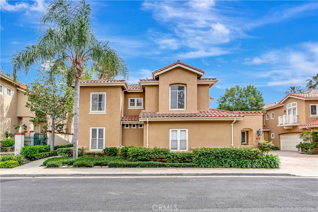 BEST VIEWS IN THE ENTIRE COMMUNITY! Positioned on one of the most coveted lots in the exclusive gated community of Corte Villa, this elegant residence offers sophisticated living with commanding, unobstructed views of the golf course. As the largest floor plan available, this corner unit combines timeless design with effortless indoor-outdoor flow, perfect for both refined entertaining and everyday luxury.
Step inside to soaring ceilings, formal living and dining rooms, and an open-concept kitchen that adjoins the expansive family room anchored by a warm fireplace. A main-level guest suite with full bath adds convenience and flexibility.
Upstairs, a generous loft creates a second living space, while the palatial primary suite is a true retreat—featuring a private balcony overlooking the fairways, a spa-inspired bath with soaking tub, dual vanities, separate shower, and a large walk-in closet. Two additional bedrooms upstairs offer ample space and privacy.
Enjoy seamless al fresco living with an oversized patio framed by lush landscaping and panoramic golf course views. Ideally located near premier shopping, fine dining, and major freeways, this home blends elegance, comfort, and unparalleled views in one extraordinary offering.
Price adjusted to reflect strong buyer interest and increasing demand for premium golf course properties. This home’s rare setting, expansive layout, and elevated positioning within the community make it a standout opportunity in today’s market.