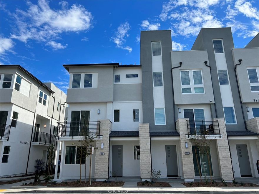 Toll Brother Terraces townhouses in a gated community. This is a 3-story floor plan that comes with a spacious rooftop facing Disneyland, perfect for enjoying the Disney firework and night sky. One bedroom on the first floor with a full bath. A 2-car attached garage, patio/balconies extend the interior living space on the main floor, upgraded kitchen with a refrigerator included. End unit with extra windows and doors, you will enjoy more natural lighting. Paid-off solar panel help reduces electric bills. Amenities included a pool, spa, and dog parks. Students have a short commute to Chapman University and California State University Fullerton. Easy access to Anaheim Garden Walk, Disneyland, The Honda Center, and Angel Stadium. Close to 5,57,91 freeways. The house is currently occupied, the current tenant will occupy it until Oct 20 2025.