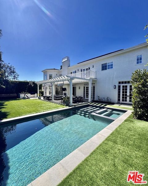 Photo of 1404 Beckwith Avenue, Los Angeles, CA 90049 (MLS # 25508725)