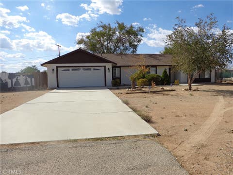 Photo of 12744 Running Deer Rd, Apple Valley, CA 92308 (MLS # CV26169997)