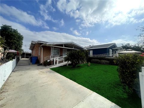 Photo of 1233 w 38th st St, Los Angeles, CA 90037 (MLS # CV25140562)