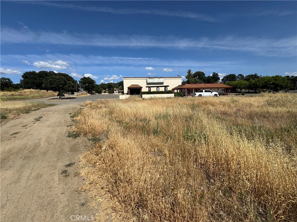Unlock the potential of this commercial lot strategically situated in the heart of town, directly across from the movie theater and the popular Safeway shopping center. This level lot boasts easy access from a paved road and is ready for your vision to flourish.
Key Features:
High Visibility: Benefit from foot and vehicle traffic.
Utilities Available: Conveniently located utilities at the street, making development a breeze.
Versatile Usage: Perfect for retail, dining, or office space – the possibilities are endless!
Seize this rare opportunity to invest in a prime location that promises growth and exposure.