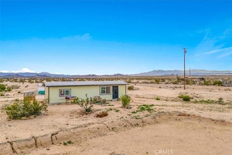 Photo of 67550 Del Oro, 29 Palms, CA 92277 (MLS # JT25271941)