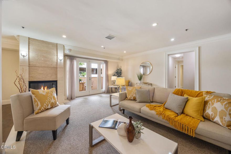 Luxury Living in the Heart of Pasadena's South Lake DistrictWelcome to a truly exceptional offering--this luxuriously renovated, single-level condo in one of Pasadena's most desirable and walkable neighborhoods. With 3 generously sized bedrooms, including two elegant primary suites, and 3 beautifully appointed bathrooms, this residence blends timeless sophistication with modern comfort.Each primary suite enjoys direct access to its own private balcony, offering a serene setting to unwind or take in the fresh air. Inside, the chef's kitchen is outfitted with rich maple cabinetry, sleek quartz countertops, and flows seamlessly into a formal dining area illuminated by a classic chandelier--perfect for entertaining in style.The spacious living room impresses with a dramatic floor-to-ceiling stone fireplace, crown molding, and recessed lighting throughout, creating an atmosphere of warmth and refinement. A separate library, den, or office with hardwood floors offers flexibility for work or quiet retreat.At the heart of the home, you'll find expansive central balconies, ideal for dining al fresco, hosting guests, or enjoying a peaceful morning coffee. A convenient in-unit laundry area enhances everyday ease.This well-maintained, secure building features elevator access and includes two assigned, side-by-side parking spaces in the gated garage for added convenience and peace of mind.Located just moments from the vibrant South Lake Avenue District, this home is surrounded by the area's most popular destinations, including SUGARFISH, Smitty's, UOVO, Green Street Restaurant, and Williams Sonoma. Easy access to Caltech, the 210 Freeway, and the Metro Gold Line makes commuting effortless.If you've been searching for the perfect blend of luxury, location, and lifestyle, your opportunity has arrived.