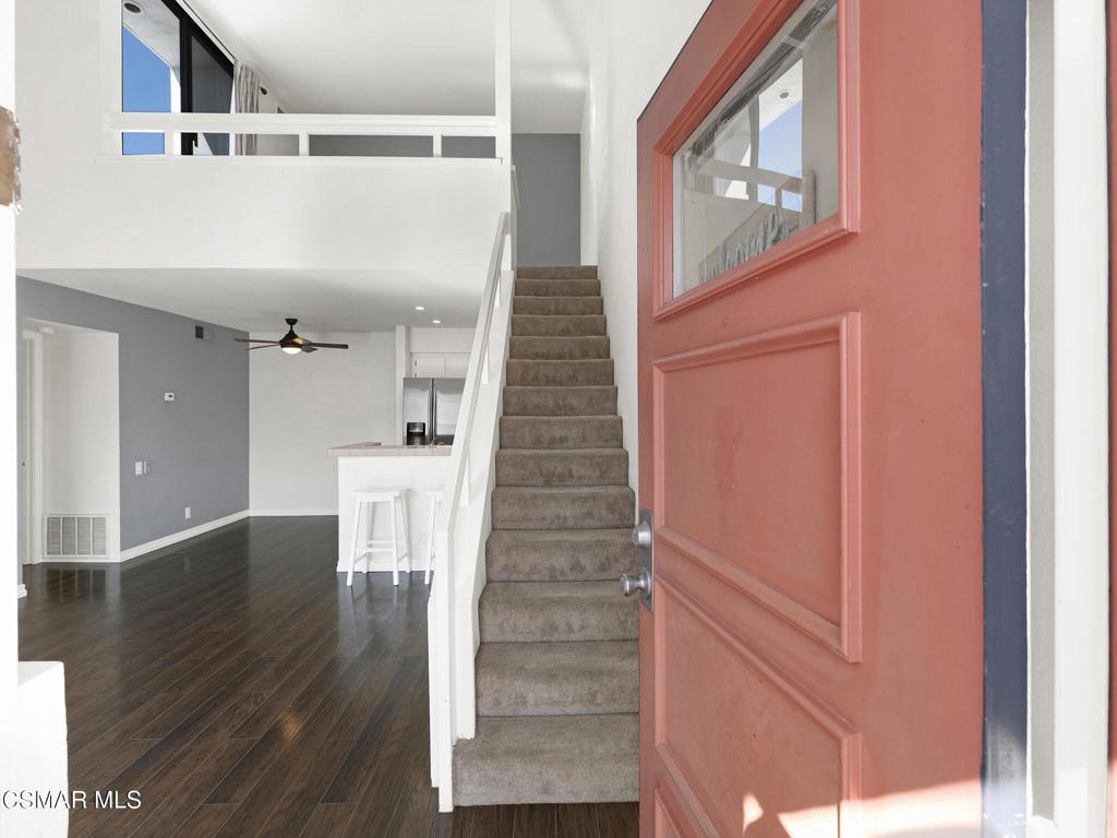 This is the sign you have been waiting for! A light and bright spacious condo with a huge open loft and two, yes 2 outdoor living spaces!! Upon entry you are greeted with a light and bright open floorpan and high vaulted ceilings. The kitchen offers a breakfast bar and dining area overlooking the family room, fireplace and main floor balcony. Also on the main floor is the primary suite that includes a large bathroom with plenty of counter space, walk-in closet and separate shower room. You also have your very own in unit laundry closet. Upstairs you will find a large open bright loft and a slider leading to yet another private outdoor deck/roof top patio ready for sunbathing, BBQ or outdoor dining while enjoying our fabulous California weather and sunsets. The loft is perfect for an office, game room, extra sleeping or guest quarters. This particular back unit offers one of the best and quiet locations in the complex being just steps away from one of the 2 pools as well as the extra allotted parking area. Which your guests will just absolutely LOVE when they come to visit! Also includes a private 1 car garage, central A/C, recessed lights and so much more. This fantastic condo is such a great find located in the beautiful Simi Valley Perfect for the commuter as well! Don't hesitate to check this one out!!