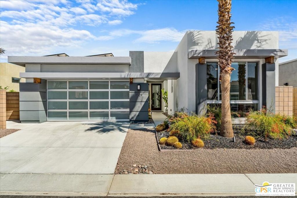 Discover the ultimate desert retreat at 4201 Amber Lane, Palm Springs in the gated Escena community! This modern oasis boasts 4 bedrooms and 3 bathrooms across a spacious 2,245 square feet of open-plan living. Step inside and let the sleek, concrete floors guide you through a home that's as stylish as it is functional. The expansive windows and sliders offer stunning pool views, filling every corner with natural light and the perfect indoor/outdoor living. The gourmet kitchen is a culinary dream, featuring a double oven, large island, pantry and ample space for entertaining. With a private saltwater pool and spa just steps away, every day is a vacation. Whether you're lounging poolside or hosting a casual get-together, the private outdoor space is your personal paradise with fruit trees and easy to maintain turf. Need a flexible space? The casita is perfect for guests or as a creative studio. Plus, with owned solar panels and a water softening system, eco-friendly living is at your fingertips. The 2 car garage has "terrazzo" epoxy floors and plenty of storage space. Some furnishings available outside of Escrow. The Escena community offers golf, a beautiful clubhouse with onsite restaurant and guard gated entry. At Amber Lane, luxury living meets modern design, offering the perfect blend of comfort and style for the discerning homeowner. Dive into your dream home today!