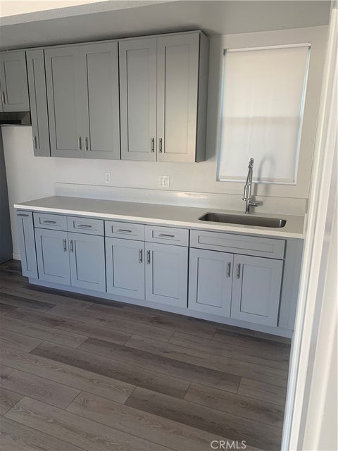 Photo of 1028 1/2 W 55th Street, Los Angeles, CA 90037 (MLS # DW26215855)