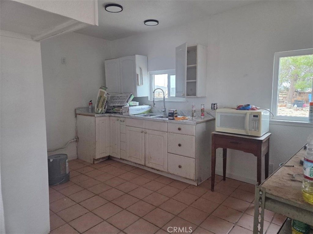 Photo of 35750 Field Rd, Barstow, CA 92311 (MLS # HD25244228)