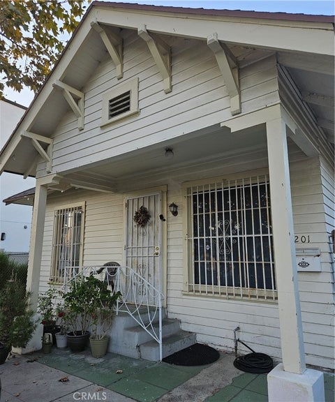Photo of 1201 Rolland Curtis PL, Los Angeles, CA 90037 (MLS # CV26189534)