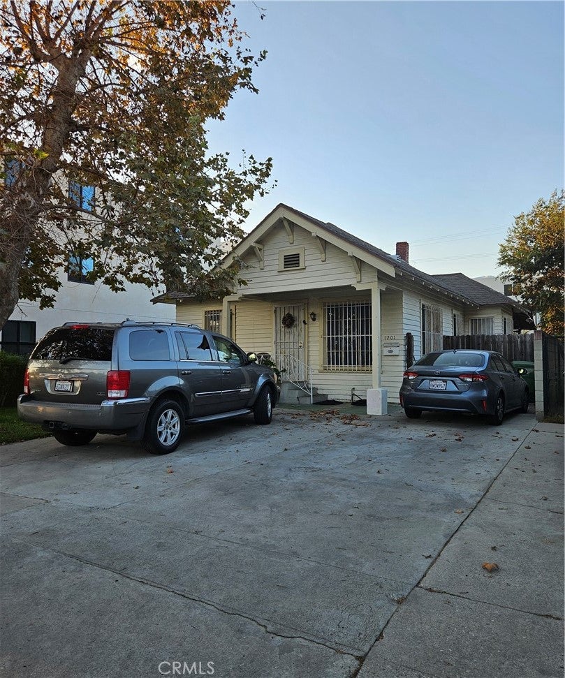 Photo of 1201 Rolland Curtis PL, Los Angeles, CA 90037 (MLS # CV26189534)