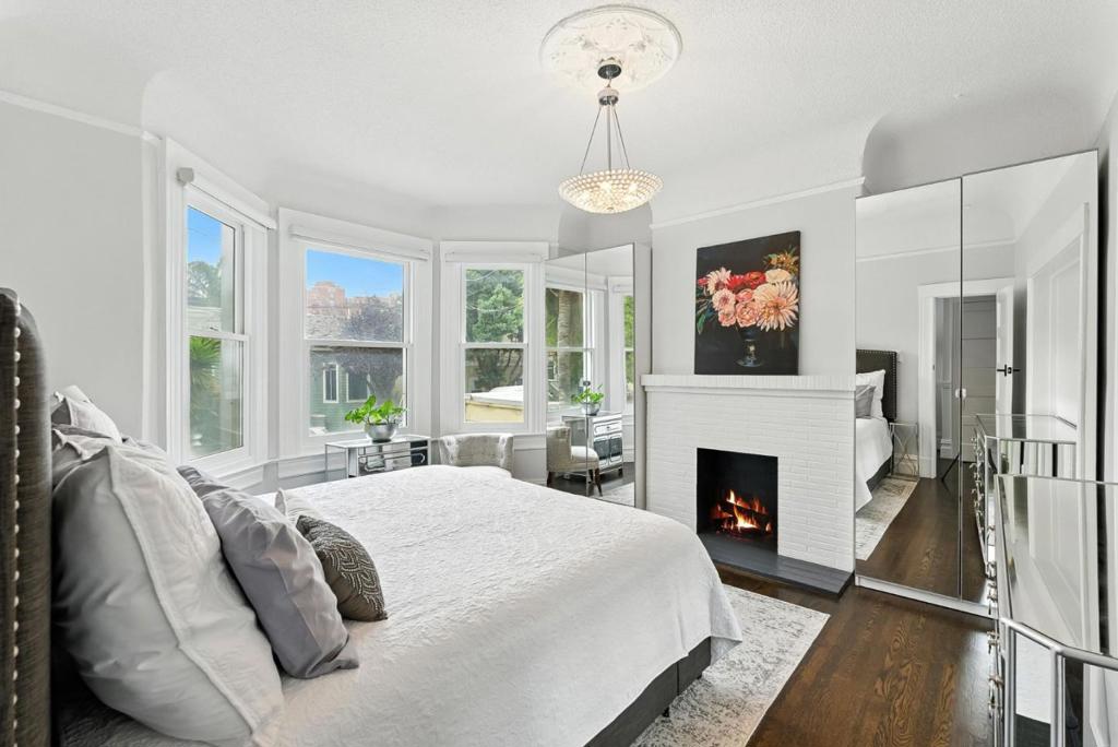 RARE GEM IN THE VIBRANT MISSION DISTRICT - 1350 SqFt Condo w/ Flex Space Must see in person to understand the possibilities! This beautifully remodeled 1350sqft gem offers one garage parking space, in-unit washer/dryer, 2 spacious bedrooms plus a versatile flex space for multi-use purposes. Enjoy high ceilings, sophisticated crown molding, rich hardwood floors, elegant bay windows and a private deck overlooking a backyard oasis. The kitchen is beautifully updated and integrated with the family room to create an open floor plan - perfect for cooking and entertaining. Enjoy stainless steel appliances, ample counter/cabinet space and a drawer shaped dishwasher. Finally, a cozy nook at the back of the home - perfect for an office overlooking the fruit trees outside. Excellent walkability score 98/100! Next to Lost Resort, El Chato, Coffee Movement, Tartine, 24th Street, 5 min to Costco and SF General Hospital. Also, seamless commuter access makes this a rare opportunity you won't want to miss!