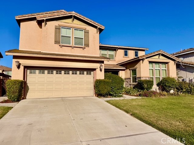 Welcome to 6650 Ashford Mill Ct, a stunning home in the heart of Eastvale boasting incredible curb appeal and a spacious layout. With an impressive 3,599 sq ft of living space, this home offers wide open areas throughout—perfect for both entertaining and everyday living. From the moment you arrive, you'll notice the pride of ownership and thoughtful design that make this property truly stand out. Whether you're hosting guests or enjoying a quiet evening at home, this expansive and beautifully maintained residence offers comfort, elegance, and room to grow.