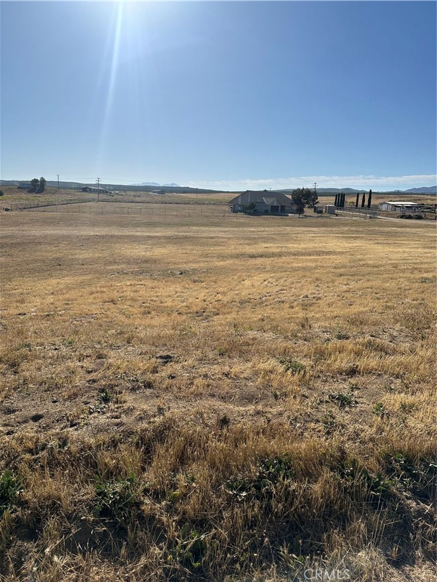 Flat to gentle rolling 2.65 ac corner lot at Roundup Drive & Iroquois Court, sits nest to new Riverside County Fire Station 77. Utilities in street in front of parcel. Parcel is lot 472 of Lake Riverside Estates Tract Map. Area of nice custom & manufactured homes, subdivision has an Airstrip, community pool, basketball courts, 50 acre lake for fishing, and there own paramedic unit. Short drive back to Temecula wine country, wineries, vineyards. For adult entertainment there is the Cahuilla Casino in Anza, or Pechanga Casino in Temecula, as well as short drive to Vail Lake, Lake Skinner & Vail Lake.