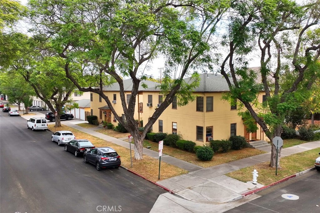 Great Value-Add opportunity in the renowned French Park neighborhood in Santa Ana. Located 1 block away from East Civic Center Drive. Be right in the action of the redevelopment going on in Downtown Santa Ana. This is a pair of fourplexes, one facing 506 Vance St and one facing 833 N Lacy. Both have a similar layout: eight one-bedroom floorplans with an eat-in kitchen, living room, and full bathroom. There are four ground-level units and four units on the second level, all with individual access. A third building houses the community/coin-op washer and dryer; the washer/dryer units are leased. Seven one-car garage spaces are available for tenant use; three face the alley towards the North East, and four face Vance St on the North West Side. The units' flooring is a combination of laminate tile and vinyl flooring, and countertops are tile. All tenants are on a month-to-month tenancy.