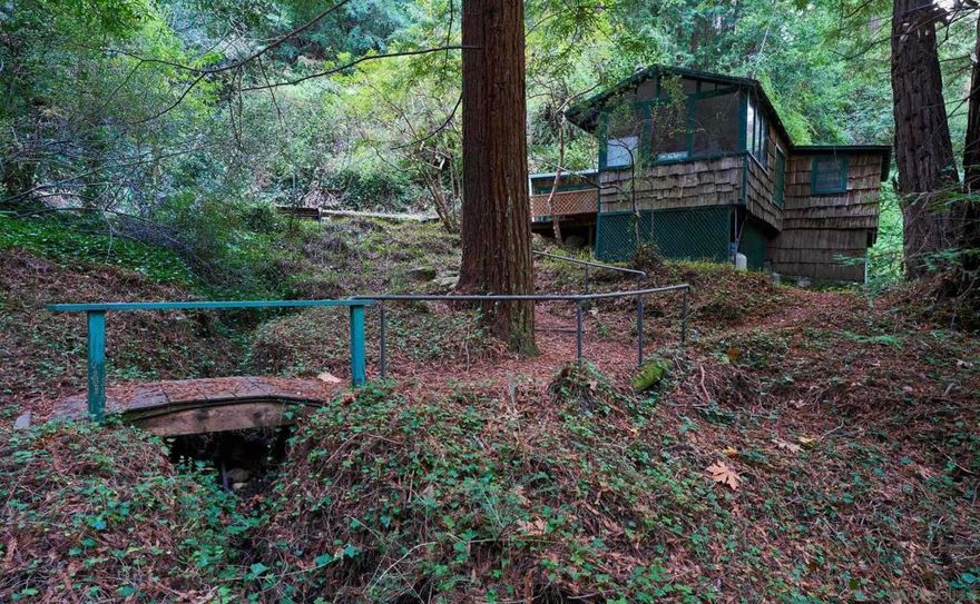 Nestled in the heart of Palo Colorado Canyon, this refreshed 2-bedroom, 1-bath cottage offers a serene living experience surrounded by majestic redwoods and natural beauty. Recent updates include fresh interior paint and new flooring, creating a bright and inviting atmosphere while preserving the home’s cozy character. Spanning approximately 4.25 acres across multiple parcels, the property provides remarkable privacy, a seasonal creek flowing through the land, and a deep well with plentiful water supply. A spacious walk-out basement adds valuable storage and flexible use space. Secluded yet conveniently located, the home is just minutes from Garrapata Beach and a scenic drive to Big Sur, placing world-renowned coastline, hiking trails, and Highway 1 vistas within easy reach. Whether envisioned as a peaceful primary residence or a private weekend escape, this unique canyon property presents an exceptional opportunity to enjoy the natural beauty and timeless appeal of the Carmel–Big Sur region.