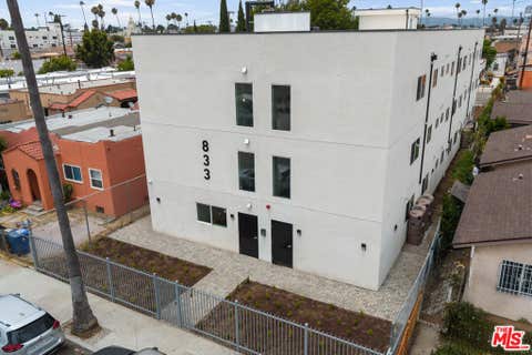 Photo of 833 W 84th Street, Los Angeles, CA 90044 (MLS # 26874467)