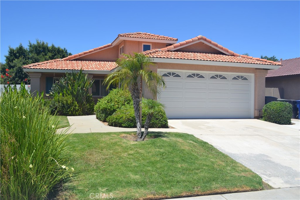 Beautifully updated one story, three bedroom, two bath home in the Orangecrest area of Riverside just 300' from the sprawling Orangecrest park which has a library, indoor sports complex, sports fields and is the location of many city leagues for children and adults. The formal entry is 10+' high with transom windows, the living rooms has tile floors, high ceilings, a fireplace and the kitchen has been remodeled with new cabinetry and granite counter tops. The third bedrooms has double doors to the living rooms, in addition to a single door to the expansive hallway, allowing use as a bedroom or office and includes built in cabinetry. The primary bedroom has a walk in closet, sliding glass door to the back patio and a large private bath with double sinks made of granite that matches the kitchen. The other two bedrooms, including the on that can be used as an office, have plantation shutters. The back yard has a nice patio cover, concrete and landscaping. The home has a tile roof, forced air and heat and all windows have been replaced with vinyl dual pane windows. Overall, this home is in excellent condition and has great appeal from the street.