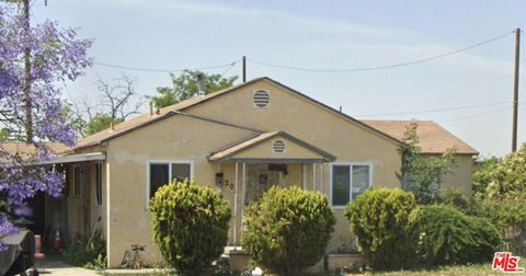 Photo of 1201 S Grandee Avenue, Compton, CA 90220 (MLS # 26645639)