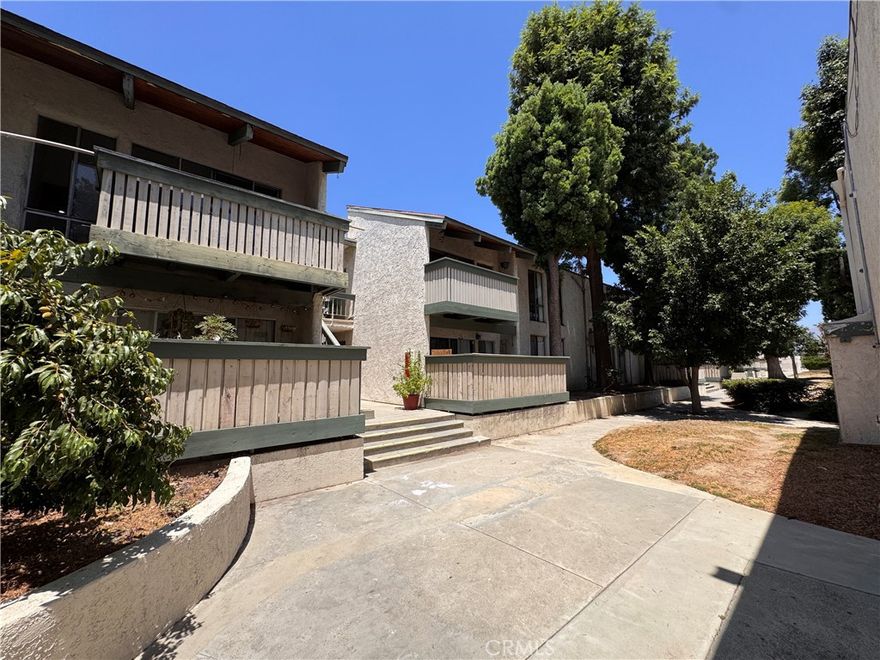 This bright upper-level condo in the Villa Park community offers a spacious and well-designed floor plan just steps from the park. Featuring vaulted ceilings, a large living room with a private balcony, and a separate dining area, the home includes two bedrooms and one bathroom. Recent updates include a remodeled kitchen with granite countertops, an upgraded bathroom with a new vanity, Nest thermostat, fresh paint throughout, and central A/C. The primary bedroom features a walk-in closet. The gated community provides secured entry, a sparkling pool, spa, clubhouse, BBQ area, greenbelt, and on-site laundry. One assigned parking space is included, with additional spots available for lease through the HOA. Gas and water are covered in the monthly dues. With easy access to freeways, public transit, Westfield Mall, and The Village, this is a fantastic opportunity for investors.