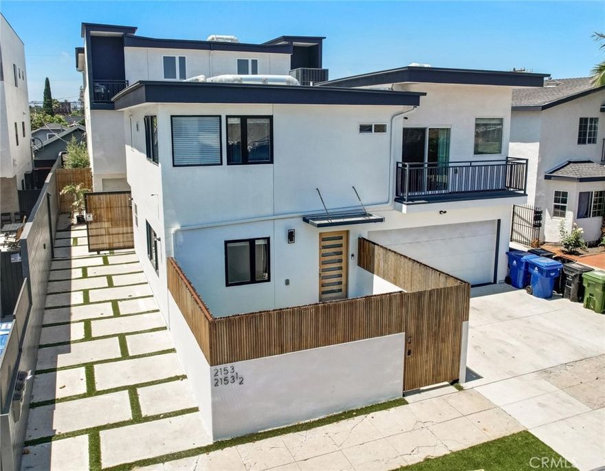 ***PRIVATE COMPOUND*** ***PRIVATE GATED DRIVEWAY*** ***PRIVATE BACKYARDS*** This is an excellent opportunity for an investor or an owner occupied wanting to live in one of the units. This ONE OF A KIND spectacular triplex featuring 3 townhouse,  offers a perfect blend of modern luxury and convenience. Almost new 2020 Construction in Mid City. The front 2 story single family home with 2 Car attached garage and rear 3 story 2 units with 2 car attached garages each with direct access to the interior from all 3 units. The rear units could be 5br 5ba or 4br + Office. All units have central Air condition,  central heating, and their own laundry. Each bedroom in all three units have their own attached bathrooms. All units comes with stainless steel refrigerator, stove, dish washer, microwave hood and washer and dryer. The rear units have private back yards with outdoor furniture and direct access from 1st floor bedroom/office/Den. All units are separately metered for water, gas and electricity. The property is well priced for the location. The property is located with in 3 miles of Culver City Art's District, Whole Foods , metro rail, many near by restaurants and not far from DTLA.  THIS IS A NON RENT CONTROL BUILDING. Don't miss out on this exceptional opportunity to live/invest in this modern, luxurious triplex in one of the most sought-after areas!