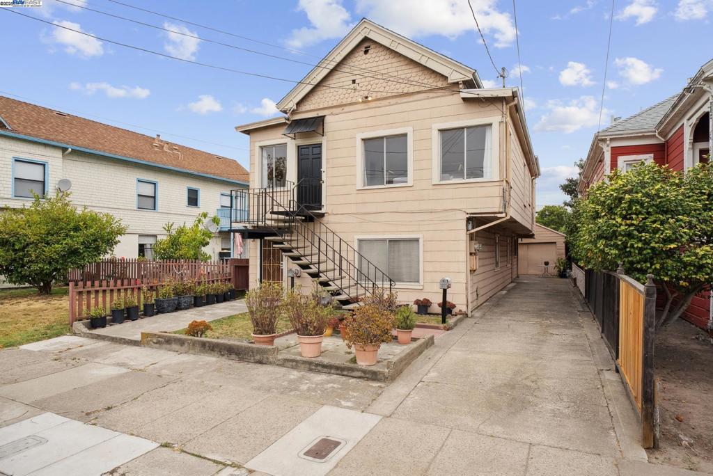 Light. Space. Possibilities. Welcome to 1805 Eagle Avenue, a rare Central Alameda duplex that blends timeless charm with modern flexibility. Just blocks from Park Street’s shops, dining, and historic theater, this property sits in one of Alameda’s desirable and walkable neighborhoods. The main level, Unit A, is the showpiece. A light-filled residence with warm wood floors, tall windows, and a skylit bath that creates a breezy, open feel. The unit includes three bedrooms and two baths, anchored by a spacious living room, a dining room, and bright kitchen, perfect for everyday living and entertaining. Unit B features two bedrooms, two baths, and a versatile bonus room that can adapt as an office, guest space, or den. The unit provides a steady income today with exciting upside potential to unlock. With more than 2,400 square feet (measured) of living space, a detached garage, and a long driveway, 1805 Eagle offers off-street parking and storage. Fully functional as a duplex, the property also invites the possibility of conversion back to a single-family residence or a multi-generational home. Offering both lifestyle appeal and investment upside, 1805 Eagle Avenue is a timeless Alameda opportunity.