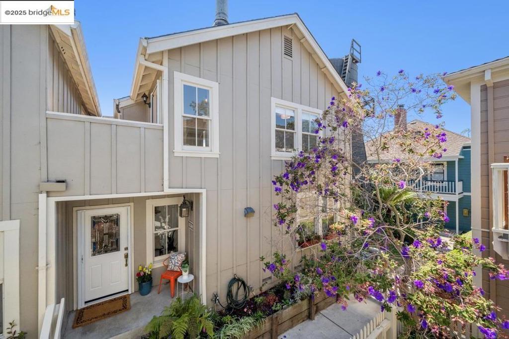 Location is everything—and at 800 Delaware, just one short block from Berkeley’s vibrant Fourth Street, you’re in the heart of it all. Quietly tucked away, this 1,192 sq ft 2+ bed, 1+ bath condo lets you ditch the car and embrace the neighborhood. A path framed by lush greenery leads to the sunlit unit, where the open floor plan welcomes you with dining and living rooms anchored by a gas fireplace. An updated kitchen, half bath with laundry, and abundant storage complete the downstairs. Upstairs, high ceilings add an airy, architectural vibe. Two bright bedrooms and an updated bath share the space with a third room, ideal for a home office, that opens to a balcony perfect for morning coffee. A deeded parking spot adds convenience, while the Transbay bus stop is just 2 blocks away, with BART and UC Berkeley a short bike ride. Step outside to Fourth Street’s eclectic mix of shops, boutiques, and dining, and immerse yourself in Berkeley’s dynamic lifestyle. A feast for the senses, this home blends convenience, charm, and opportunity—Live Berkeley, Live Vibrant!