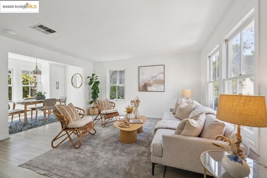 Location is everything—and at 800 Delaware, just one short block from Berkeley’s vibrant Fourth Street, you’re in the heart of it all. Quietly tucked away, this 1,192 sq ft 2+ bed, 1+ bath condo lets you ditch the car and embrace the neighborhood. A path framed by lush greenery leads to the sunlit unit, where the open floor plan welcomes you with dining and living rooms anchored by a gas fireplace. An updated kitchen, half bath with laundry, and abundant storage complete the downstairs. Upstairs, high ceilings add an airy, architectural vibe. Two bright bedrooms and an updated bath share the space with a third room, ideal for a home office, that opens to a balcony perfect for morning coffee. A deeded parking spot adds convenience, while the Transbay bus stop is just 2 blocks away, with BART and UC Berkeley a short bike ride. Step outside to Fourth Street’s eclectic mix of shops, boutiques, and dining, and immerse yourself in Berkeley’s dynamic lifestyle. A feast for the senses, this home blends convenience, charm, and opportunity—Live Berkeley, Live Vibrant!
