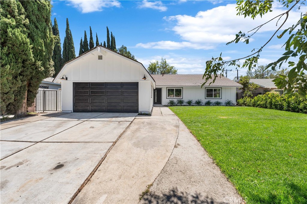 Welcome to 2730 Niles Street, a stunning fully remodeled home located in the highly desirable Texas Tract neighborhood of Simi Valley. This beautifully updated single-story residence features 4 spacious bedrooms and 2 modern bathrooms, offering the perfect blend of style, comfort, and functionality. From the moment you step inside, you'll be impressed by the open-concept layout, highlighted by brand-new flooring, fresh interior and exterior paint, recessed lighting, and designer fixtures throughout. The heart of the home is the completely renovated kitchen, showcasing sleek quartz countertops with a dramatic waterfall island, custom tile backsplash, and stainless steel appliances. It seamlessly connects to the dining and living areas, making it ideal for both everyday living and entertaining. Both bathrooms have been tastefully updated with contemporary finishes and thoughtful design. The home also features all-new windows and doors, enhancing natural light and energy efficiency. The primary suite offers a peaceful retreat with a modern en-suite bathroom and ample closet space. The two additional bedrooms are bright and versatile, perfect for family, guests, or a home office. Outside, the private backyard offers plenty of room to entertain, garden, or add a pool or ADU, with potential RV access and a spacious 2-car garage. Located in a quiet, tree-lined neighborhood close to parks, award-winning schools, shopping, and freeway access, this home truly has it all. Don’t miss the opportunity to own a move-in-ready, fully upgraded home in one of Simi Valley’s most sought-after communities.