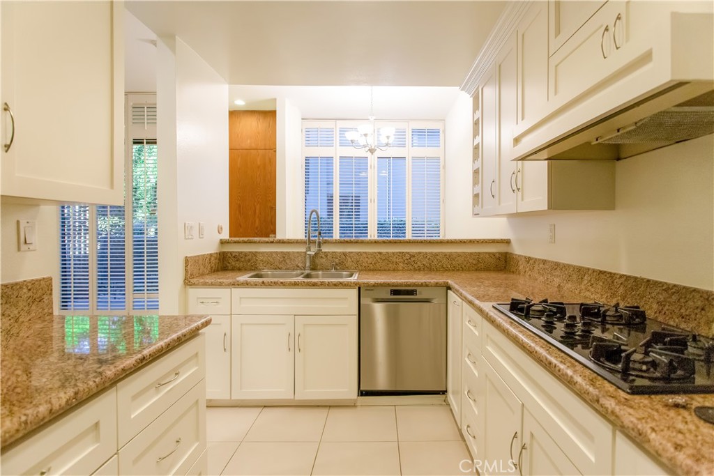 Located in a well maintained complex in the sought after Pasadena neighborhood of Madison Heights, this light and bright two-story unit offers generous space in an ideal urban setting. Enter on the first floor to find a spacious living and formal dining room, and kitchen with ample cabinetry. Floor-to-ceiling windows saturate the living area with sunlight and provide an entry to an outdoor private patio area. There is a half bathroom downstairs for guests. Two roomy bedrooms balance out the home on the second level. The unit also includes private laundry and two side-by-side parking spaces, and within the gated complex one can enjoy a sun-drenched pool, spa and terrace ready for dining, entertaining, or relaxation. Conveniently located near Old Town Pasadena, South Lake District, the Gold Line, this townhouse is surrounded by all the best Pasadena has to offer. Rent includes trash and water.