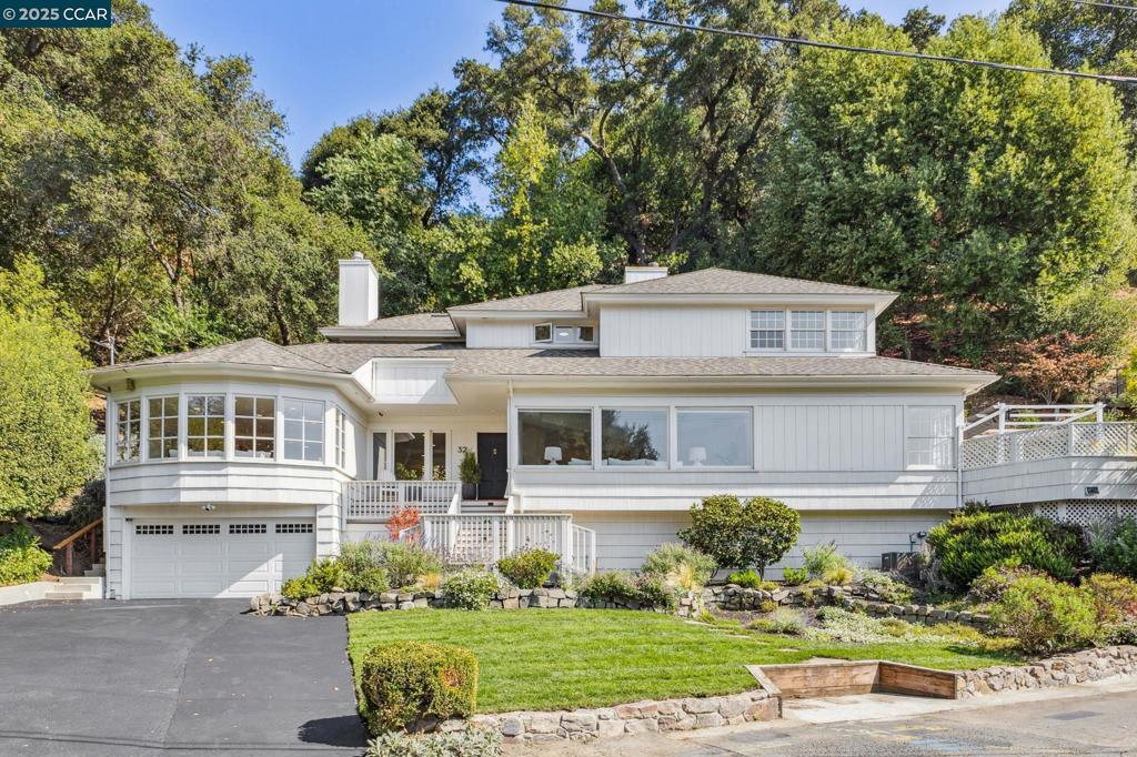 Sitting proudly in the Orinda Country Club hills with views overlooking Lake Cascade. 4 BR, 3.5 BA, 3163 sf traditional beauty, with unparalleled street appeal. Fully landscaped, flat front/side backyard. Cathedral ceilings in living areas and bay windows that soak in views and light. Beautiful large quality wood windows in every room. A well-appointed kitchen with plenty of workspace, an adjacent family room, formal dining room, and breath-taking spacious living room with wood burning fireplace. All flowing seamlessly for entertaining large and small gatherings and a busy family. Gorgeous light wood floors throughout the living area. Street level there are 2 nice-sized bedrooms and a full bath off the kitchen and a laundry/mudroom. Up a gorgeous formal staircase, there is a sumptuous primary suite with huge windows and views of Lake Cascade on one side and private back deck on the other. Substantial tiled master bath w/ bathtub, shower, separate toilet and a large cedar walk-in closet. Another well-sized fourth bedroom and full bath. .59 acres with stunning views, landscaped, decking for entertaining and barbecuing and a large flat side lawn with plenty of room to roam and play. Miramonte schools, close to town. Hike the hills and loop around Lake Cascade. Magical!