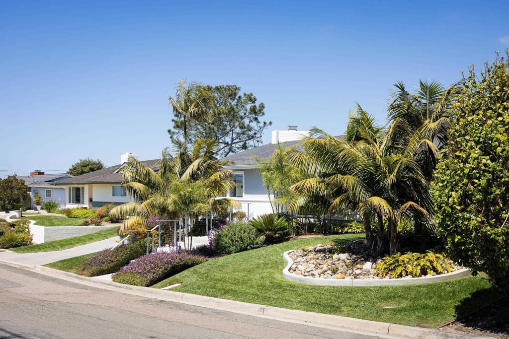 This thoughtfully remodeled home sits on a peaceful cul-de-sac in Muirlands Lower, just a short walk to Windansea Beach, La Jolla Village, the Farmer’s Market, and top-rated public schools. Enjoy peek ocean views and beautiful real white oak flooring throughout. Over the past three years, the property has been extensively updated with fresh interior and exterior paint, new fixtures, hardware, and a modern HVAC system. One of the few homes on the block with a pool, the backyard features brand-new landscaping and hardscaping with full sun exposure all day. The solar-heated PebbleTec pool is smart-home integrated for easy control. A rare opportunity for quintessential Southern California living.