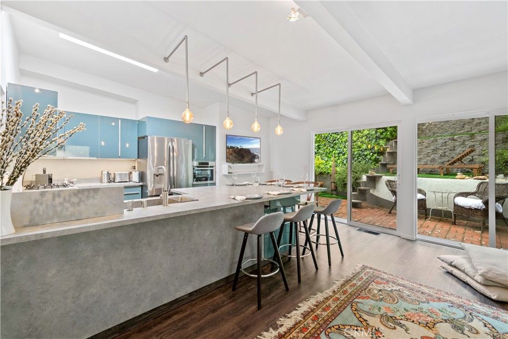 Photo of 1793 N Beverly Glen Boulevard, Los Angeles, CA 90077 (MLS # OC25177337)