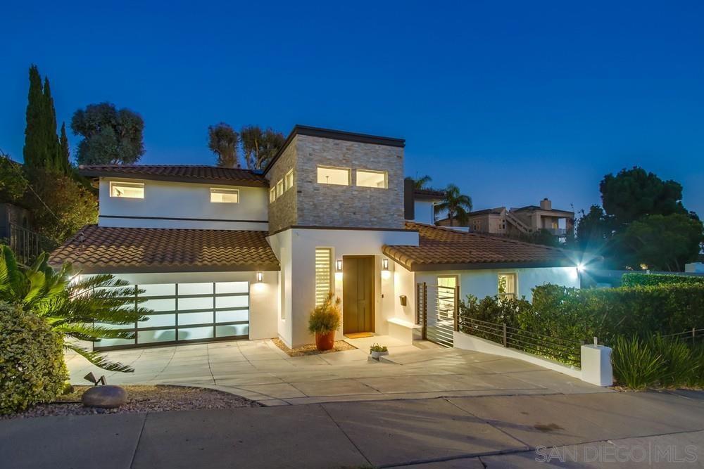 Modern coastal Home, recently remodeled, in LA JOLLA. This stunning 6 bedroom, 6.5 Bathroom home offers an ideal layout with 2 bedrooms on the main level and 4 upstairs. The primary suite features partial ocean views and a fireplace. The spacious floor plan includes a brand new constructed playroom/pool room with its own full bathroom, perfect for entertaining or guest use. Professionally designed, this exquisite home features rare upgrades like; Stone finished walls in foyer and bathroom, Seamless Walnut Texture kitchen cabinets with sandblasted glass doors and white macaubas and dark gray quartzite counter-tops. Stairs are made from steel structure and covered with Oak Wood with stainless steel handrail and tempered glass. Window coverings are dual neolux with motorized roman shades in Master Bedroom. Enjoy the convenience of key-less entry system with Ring doorbell. Take in the sun at the pool, completely renovated. You will truly enjoy touring the decor and openness of this magnificent home, designed for comfort and entertaining, this home blends modern upgrades with coastal charm.