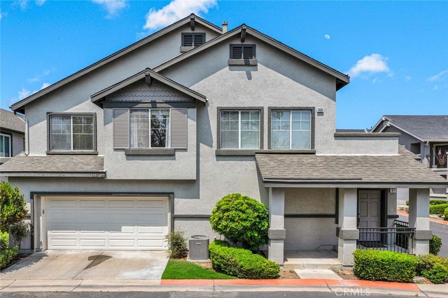 Welcome to 3433 E. White Chapel Court #F, a turnkey end-unit townhome situated on a quiet cul-de-sac in the gated Huntington Community of Orange. This highly sought-after floorplan lives like a detached, single-level home, as the bedrooms do not share walls with neighboring units. This dream home offers two bedrooms, two bathrooms, newer HVAC, a newer water heater, updated interior paint, upgraded luxury vinyl plank flooring throughout, vaulted ceilings, a two-car garage with direct access, and abundant natural light. The living room, which overlooks the balcony, opens to the kitchen and dining area, making it perfect for entertaining. The remodeled kitchen features granite countertops, stainless steel appliances, a newer dishwasher, and a dining area with balcony access. The spacious master suite includes a vaulted ceiling, ample natural light, an attached full bathroom with dual vanities, and a walk-in closet. The Huntington Community features a resort-style pool, spa, greenbelt areas, and a gated entry. You can walk to Grijalva Park, shopping, and dining, with easy access to the 55, 22, and 91 freeways, as well as the 241 and 261 toll roads. 3433 E. White Chapel Court #F is a must-see!