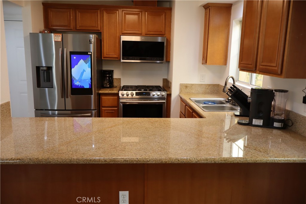 Newer-built two-story home in excellent condition and move-in ready. Prime location with easy freeway access and close proximity to shopping centers and dining. Several schools within walking distance add to the convenience. This home is ready for its next owner — schedule a showing today. Attached garage and direct access makes this home very functional. Beautifully landscaped walkways and it's own fenced off yard provide a serene oasis. Master bedroom with Walk in closet and full bathroom and a small balcony. Skylights throughout provide plenty of natural light.