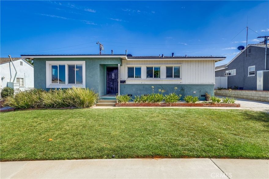 This charming 3-bedroom, 1 3/4-bath home offers an ideal floor plan with seamless flow and modern potential. As you step inside, you are greeted by an expansive and open living room, where natural light pours in through large windows that frame a beautiful view of the lush, green backyard. The inviting space is adorned with rich hardwood floors that flow throughout the home, adding warmth and elegance.  This home features a thoughtfully designed bedroom layout to meet a variety of needs.  One of the bedrooms functions as a perfect work-from-home (WFH) space, complete with its own attached 3/4 bathroom for added privacy and convenience. This flexible space could also serve as a private retreat for a teenager or a guest suite.

The other two bedrooms are generously sized and well-appointed, each offering ample closet space to keep everything organized.

Practical features include inside laundry, offering the ultimate convenience. Outside, the oversized, detached garage presents a fantastic opportunity for an Accessory Dwelling Unit (ADU) conversion. This is ideal for generating rental income, providing a private guest house, or creating a multi-generational living space. The spacious backyard and ADU potential make this property a truly special find in a desirable Whittier location.