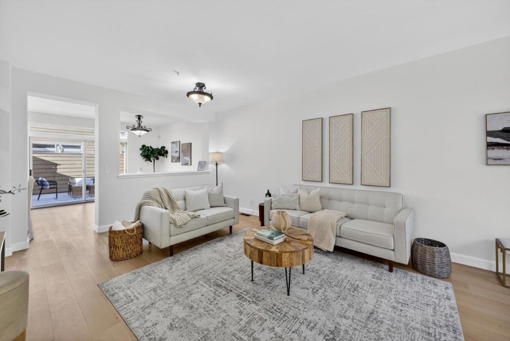 Welcome to 1168 La Rochelle Terrace Unit B, situated in Sunnyvale's highly desirable Traditions community, designed for comfort, tranquility, and convenience. This beautifully remodeled Townhouse features 3 beds, 2.5 baths, 1,923 square feet of living space and is filled with abundant natural light streaming through the large windows and skylights. This stunning property has been remodeled with high end designer finishes. Additional upgrades include fresh interior paint throughout, new floors, and recessed lighting. Enjoy the open concept living area with two separate private balconies, perfect for relaxing and entertaining. Retreat to the oversized primary suite featuring a walk-in closet, dual sinks, and shower over tub. Two additional generously sized bedrooms, plus a versatile large bonus room downstairs that can be used as an office, 4th bedroom, game room, or additional living space to host friends and family. The HOA covers water, garbage, earthquake insurance, pool, spa, & more. Prime location just a short walk to Seven Seas Park, VTA, grocery stores & local cafes. Minutes to Downtown Sunnyvale with great shopping, dining & entertainment. Excellent access to local transit, freeways, and major high tech companies. A rare opportunity in a peaceful, tree-lined community!