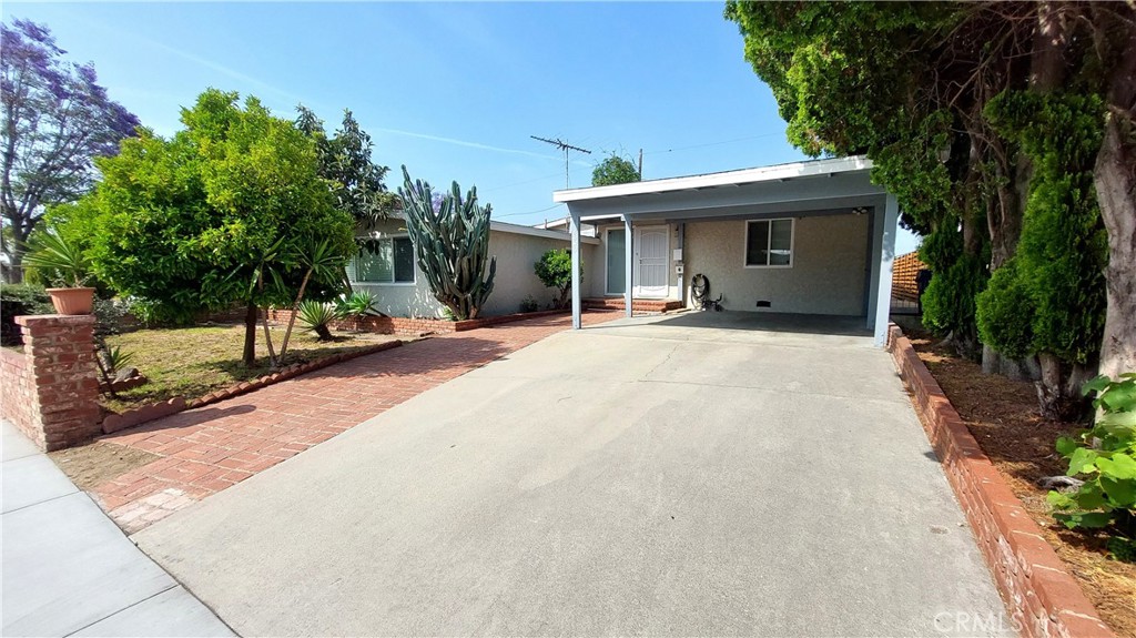 Turnkey Charm in the Heart of Panorama City. Step into this beautifully remodeled 3-bedroom, 3-bathroom home offering 1,630 square feet of thoughtful design and modern comfort. Set in a desirable neighborhood of Panorama City, this open-concept gem features a spacious family room, dedicated dining area, and a cozy breakfast nook just off the kitchen. Every detail has been upgraded—from the sleek quartz countertops and porcelain flooring to the recessed LED lighting and double-pane windows. Enjoy peace of mind with all-new electrical wiring (including a 200-Amp main panel and 80-Amp sub-panel ready for a future ADU), copper plumbing, and wall heaters. Freshly painted inside and out, the home is framed by a charming wood fence and adorned with mature Mandarin, Loquat, and Italian fig trees — your own private orchard. Located within walking distance to shopping, dining, and public transportation, this move-in ready property is ready to welcome you home.