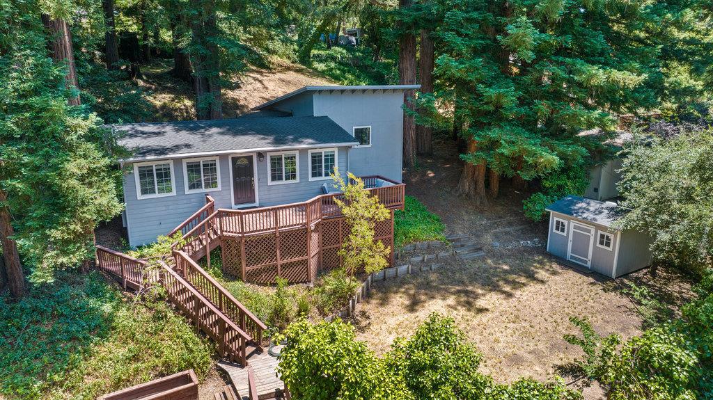 Welcome to 10377 Lake Blvd Your Sunny Felton Starter Home! This charming mountain retreat is the perfect opportunity for first-time homebuyers to put down roots. Nestled among the redwoods yet basking in the sun, this home offers a rare combination of privacy and light. The spacious, sun-drenched front yard features garden boxes ready for your summer garden ideal for those dreaming of farm-to-table living. Inside, you'll find a cozy and functional layout with 3 bedrooms and 2 full bathrooms, including a mudroom and inside laundry! With a newly updated kitchen, this home has great potential to personalize and make your own. Priced to sell and full of possibility, if you have been dreaming of living in the Santa Cruz Mountains, with peaceful lifestyle, close to nature, and just minutes to town - this is it. Want to visit? It is best to drive up Carrol Ave and then turn right onto Lake Blvd.