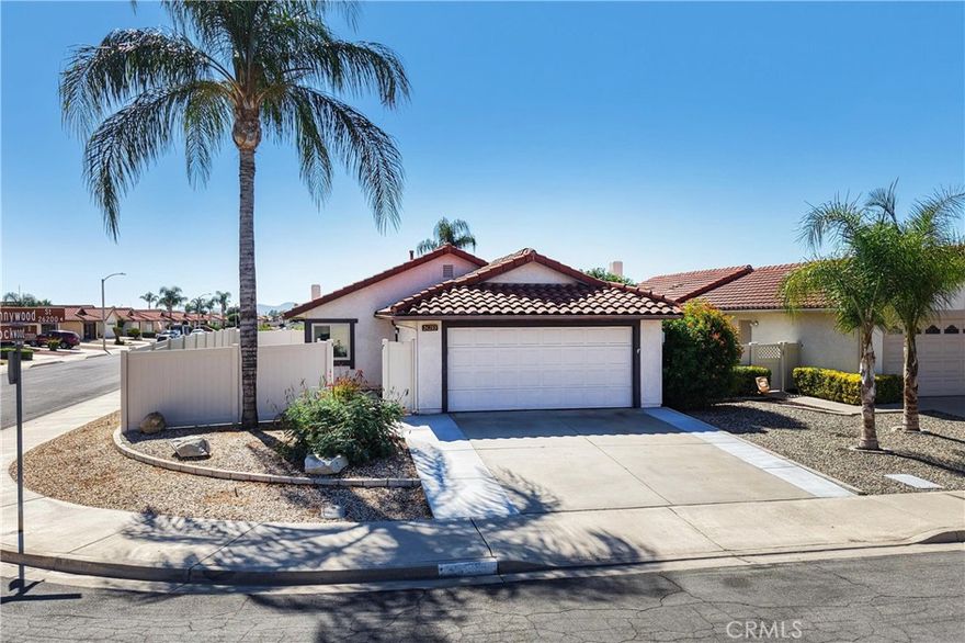 Absolutely Gorgeous!! This incredible single-story home sits on a large corner lot. It is nestled in the beautiful and highly coveted "The Patio Homes" community in Menifee which provides relaxed style living and beautiful aesthetics. Situated on over 4,300 sq ft lot and showcasing nice views, spaciousness, and privacy, you will absolutely love the uniqueness this lot and location have to offer. The home is a corner lot home and has an amazing front yard and a large 2 car garage. The home is equally amazing and meticulously cared for. Pride of ownership permeates this house as it boasts many upgrades and amenities such as bright and open floor plan, beautiful tile and carpet flooring, baseboards, tall ceilings, ceiling fans, huge kitchen with a lot of cabinets, granite countertops and custom granite/tile backsplash, stainless steel appliances, gas fireplace, spacious primary bedroom with 2 large closets, large bedrooms (one of which with a Murphey style bed), the backyard/side yard are spacious and great for entertaining friends and family, BBQing and so much more. Lastly, the community offers a pool and spa and other amenities for only $40/month with very low taxes! Words and pictures can never convey the beauty this home and neighborhood have to offer, come and see for yourself!!