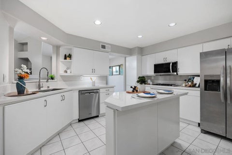 Photo of 11916 Tivoli Park ROW #8, San Diego, CA 92128 (MLS # 260022376SD)