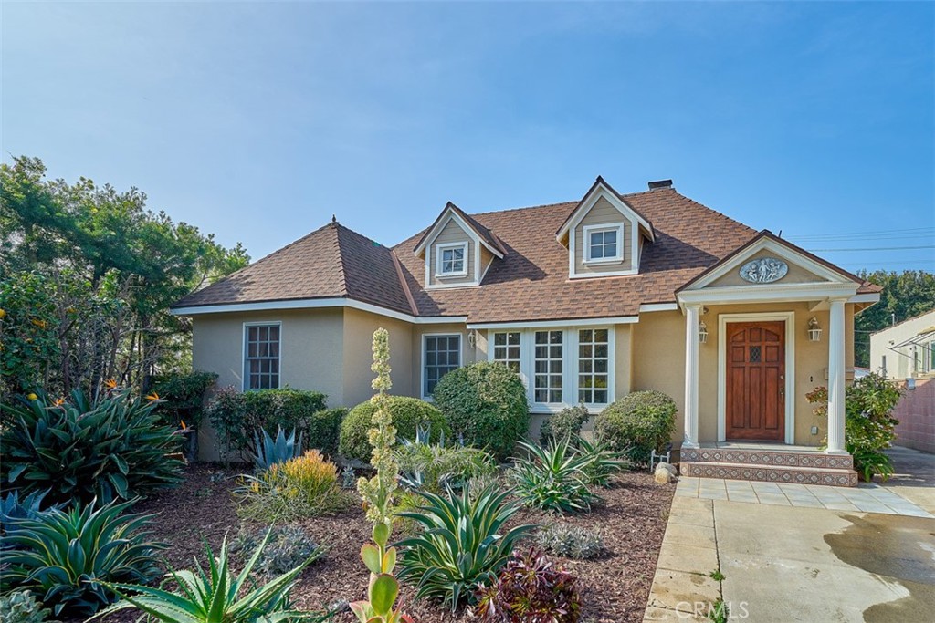 Charming Single-Story French Country-style Home in the Heart of Brentwood. Located on a 7,000 sq ft lot, this beautifully maintained 3-bedroom, 3-bathroom home offers 1,980 sq ft of living space (not including the garage-converted studio). Step through the welcoming foyer into a bright and airy living room with gleaming hardwood floors and a cozy fireplace. The open-concept layout seamlessly connects the spacious living room, dining area, and family room—creating a generous and versatile space perfect for entertaining or family gatherings. The kitchen features granite countertops, two double sinks, and plenty of cabinetry for storage and functionality. Enjoy year-round comfort with central A/C and heating. The professionally landscaped front and rear gardens offer serene outdoor living, enhanced by an impressive collection of fruit trees. In the backyard, a converted garage functions as a private guest studio complete with a bathroom—ideal for visitors, extended family, or creative space (not included in the main home’s square footage). Conveniently located with easy access to Brentwood Village, shopping, dining, and the 405 Freeway, this home blends timeless charm, modern comfort, and an unbeatable Westside location. Pictures taken before tenant moved in. No pet application only, no exception !!