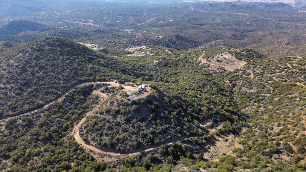 PRICED TO SELL! On the top of the Mountain you can see all of Anza. 40.4 acres of land available with electric meter and a well. 5000 gallon water tank. Also on the property are 2 large and long mobile homes which convey with the property. Come look at amazing sunsets, sunrises, stars, and city lights.