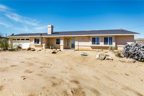 Photo of 8444 Acoma Trail Trl, Yucca Valley, CA 92284 (MLS # PF26054684)