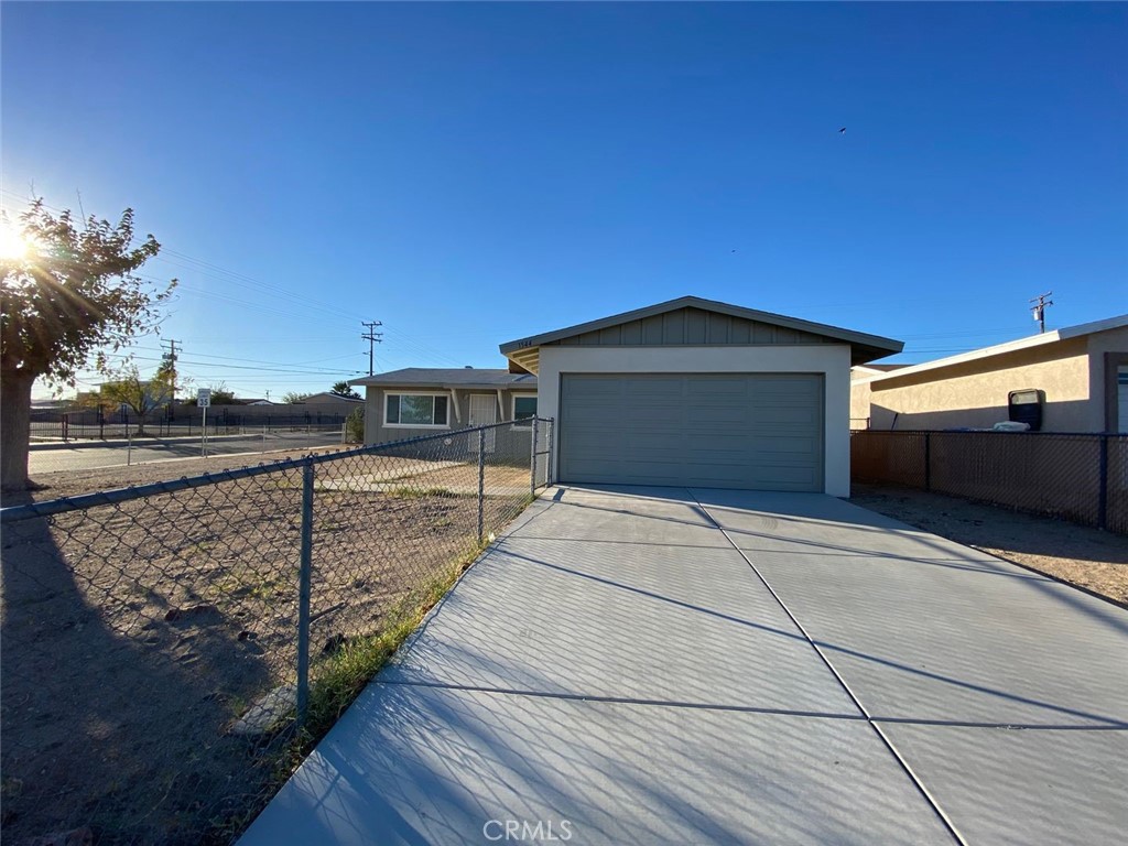 This Charming 3 bedrooms, 2 bathrooms home features comfortable living space in a growing community. Great size bedrooms. Living room and dining area. Kitchen offers plenty of cabinet space. Large corner lot fully fenced. Attached 2 car garage. Conveniently located near public transportation and major freeways which will provide easy access for commuters. Shopping centers and grocery stores are just minutes away. Come see it today!!